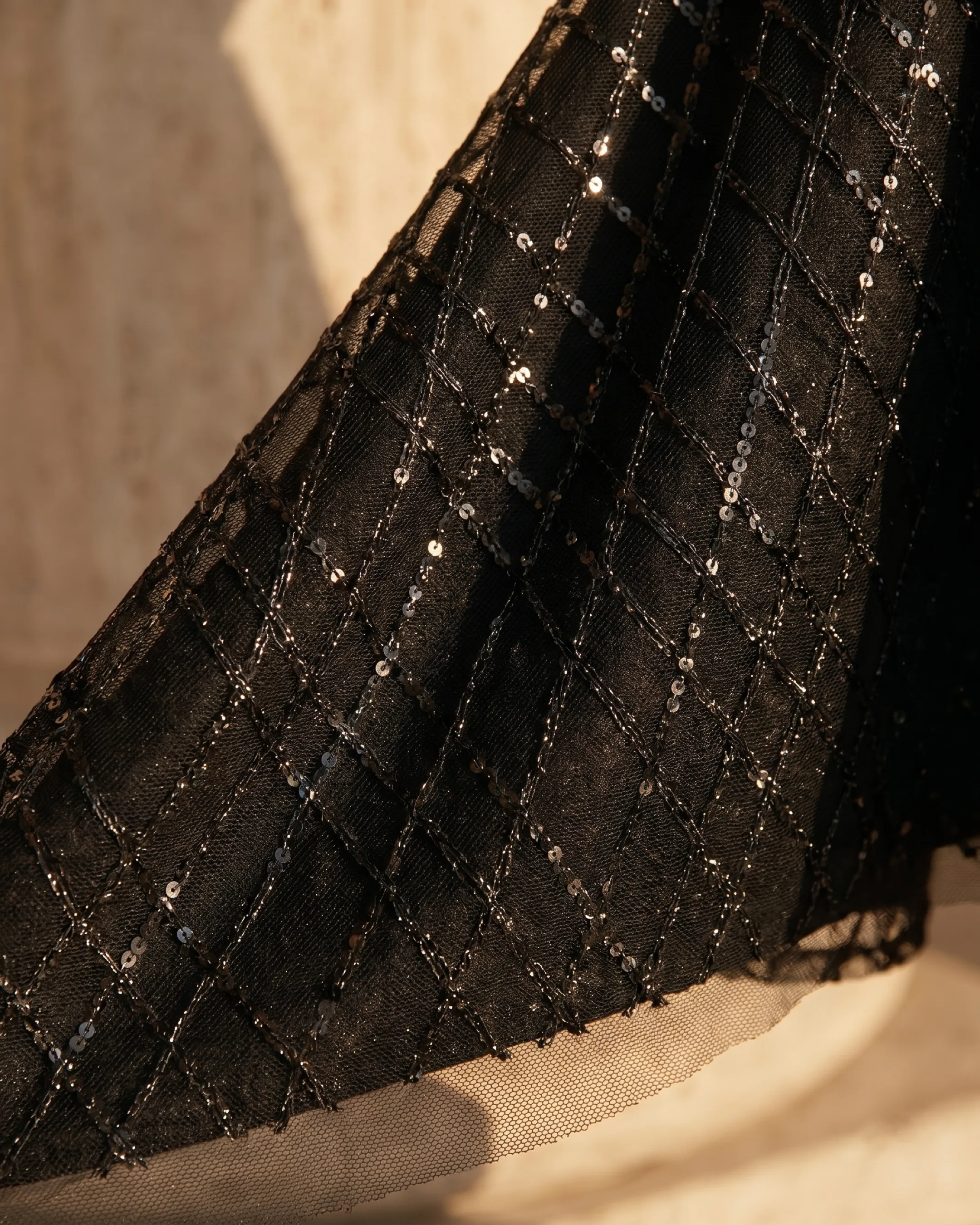Hugo Caesar Tassi Albia macro of the structured crepe embroidered with a fine geometric sequin and glitter lattice on illusion mesh