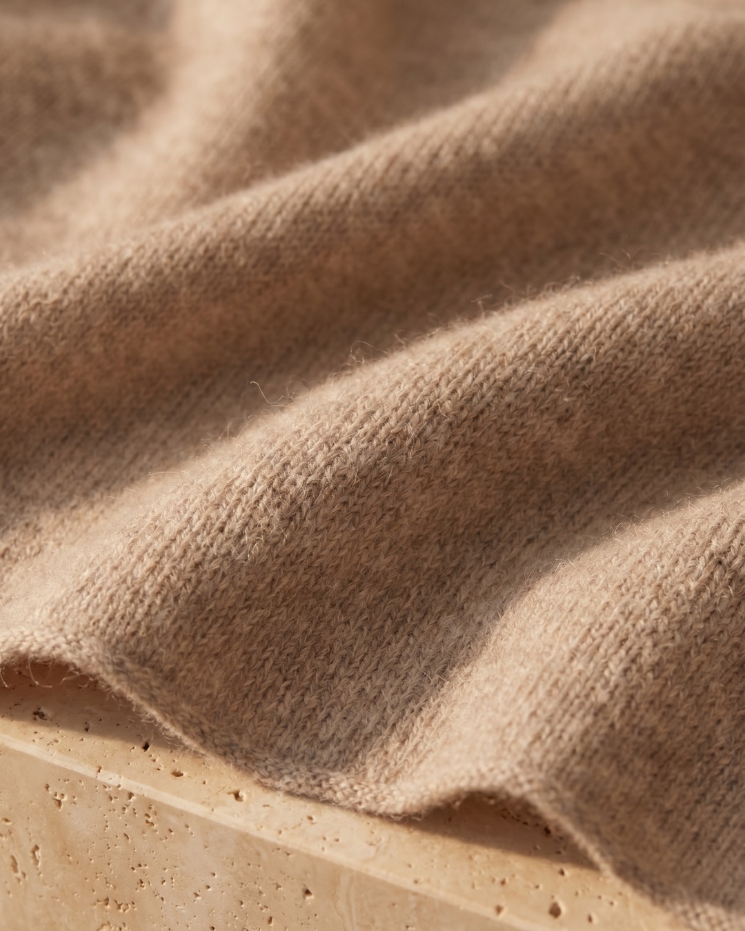 Hugo Caesar Tassi Aquileia stole fabric close-up showing the fine heathered cashmere knit