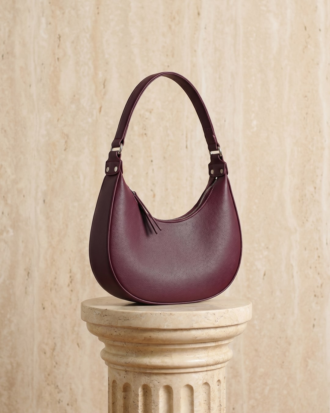 Hugo Caesar Tassi minimalist crescent leather shoulder bag in Porpora — studio packshot, Hugo Caesar Tassi