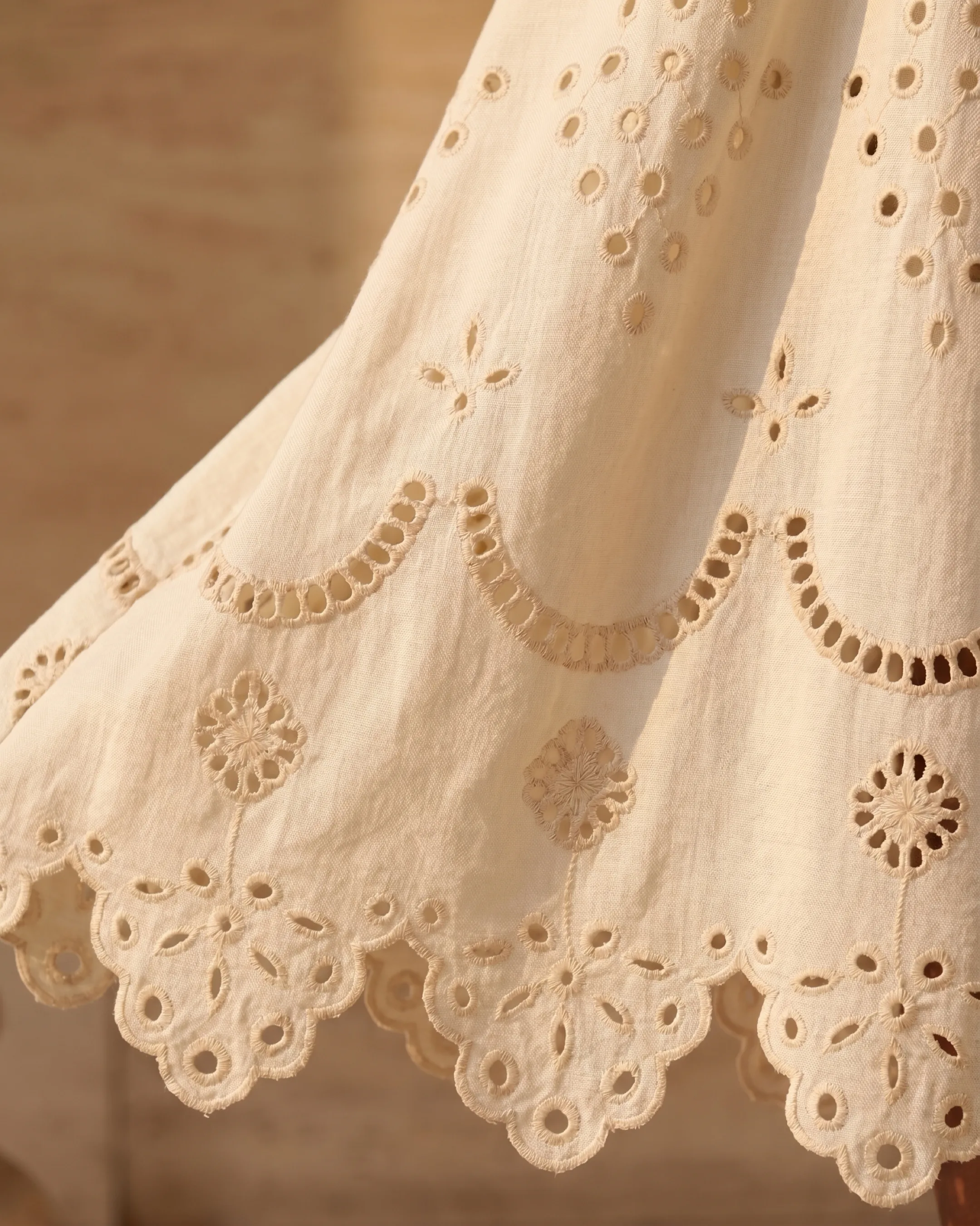 Hugo Caesar Tassi Plautina ivory cotton-linen with scalloped broderie-anglaise eyelet hem, macro