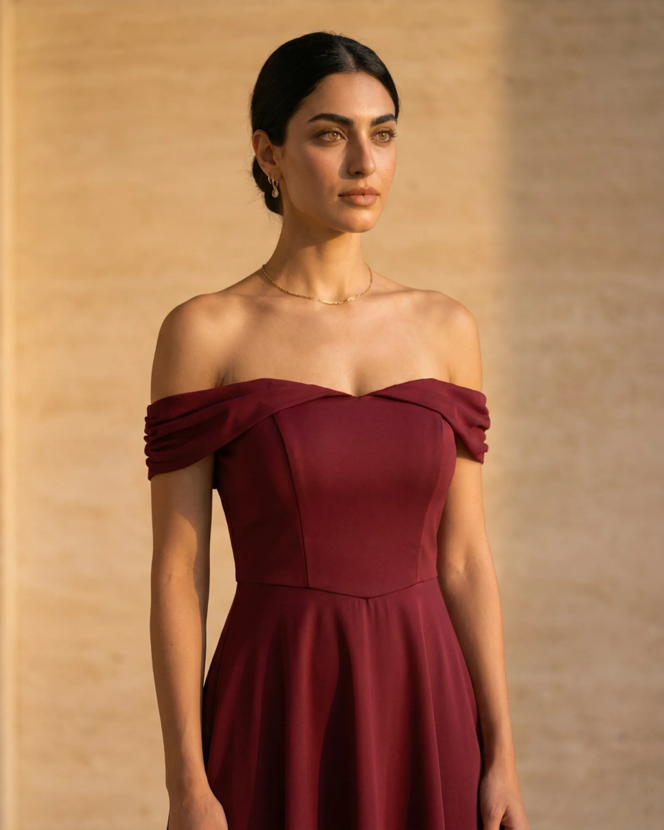 Hugo Caesar Tassi Sabina close-up of the off-shoulder draped band, spaghetti straps and sweetheart bodice in Porpora wine satin